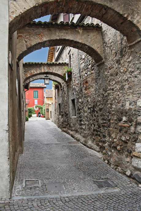 Narrow streets Sirmione lake Garda photo
